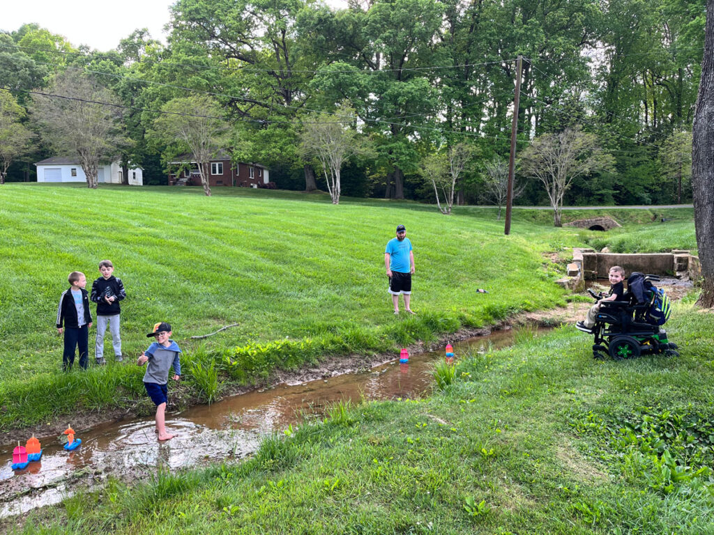 Explorers having creek time